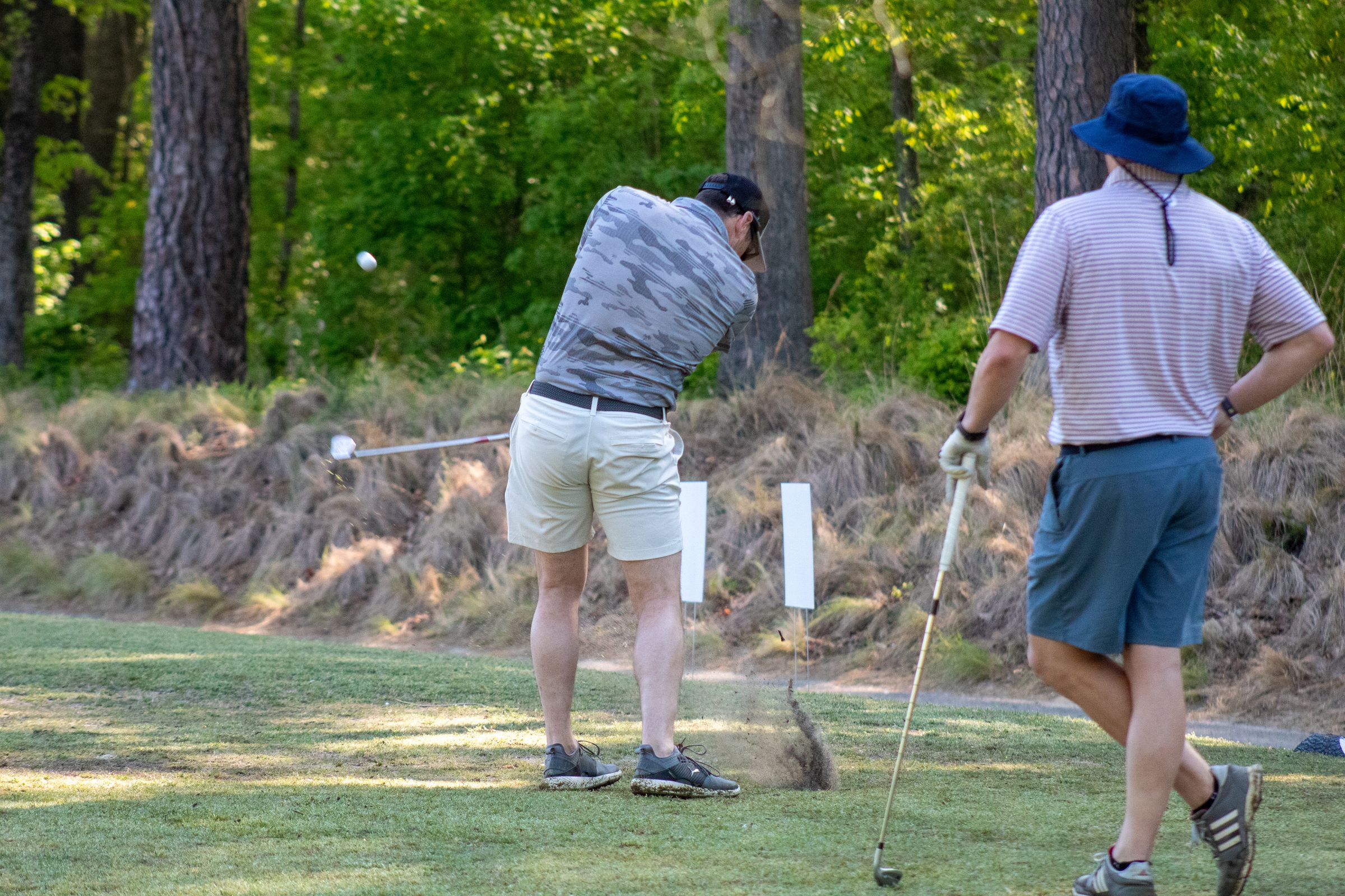 Golfers teeing off at the Inaugural MVF Golf Tourney