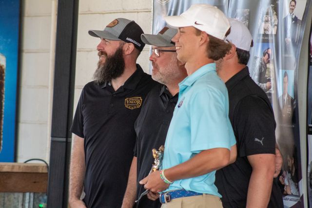 Golfers sharing a laugh between holes