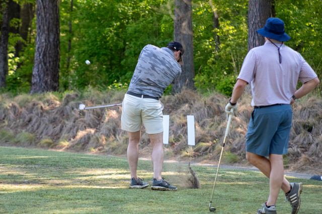 Golfers teeing off at the Inaugural MVF Golf Tourney